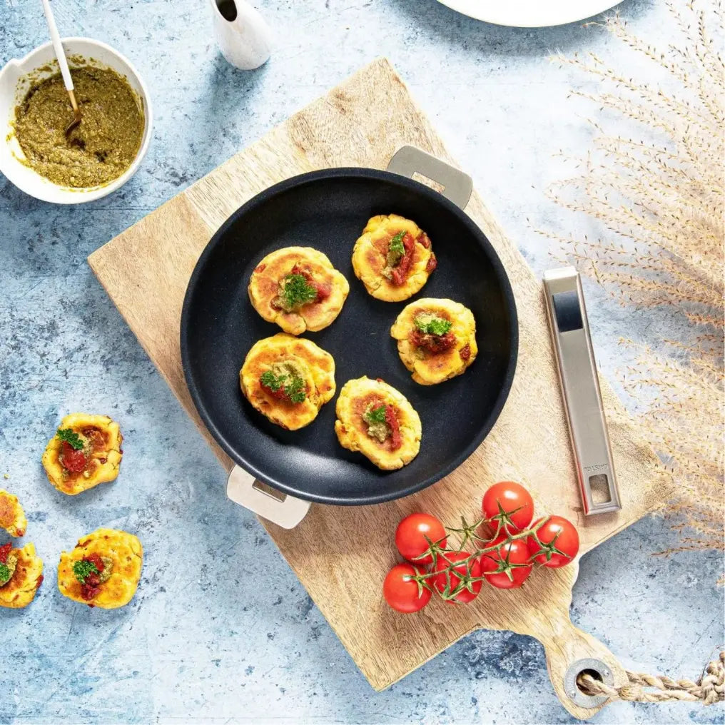 Fryday Friday get your fryon with this non-stickdeepfrying Pan.